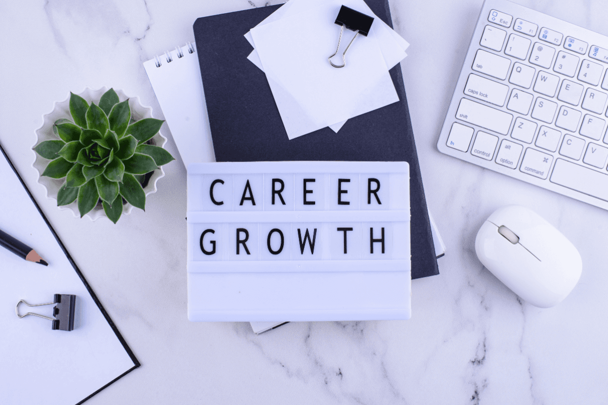 Desk with a lightbox sign that reads Career Growth