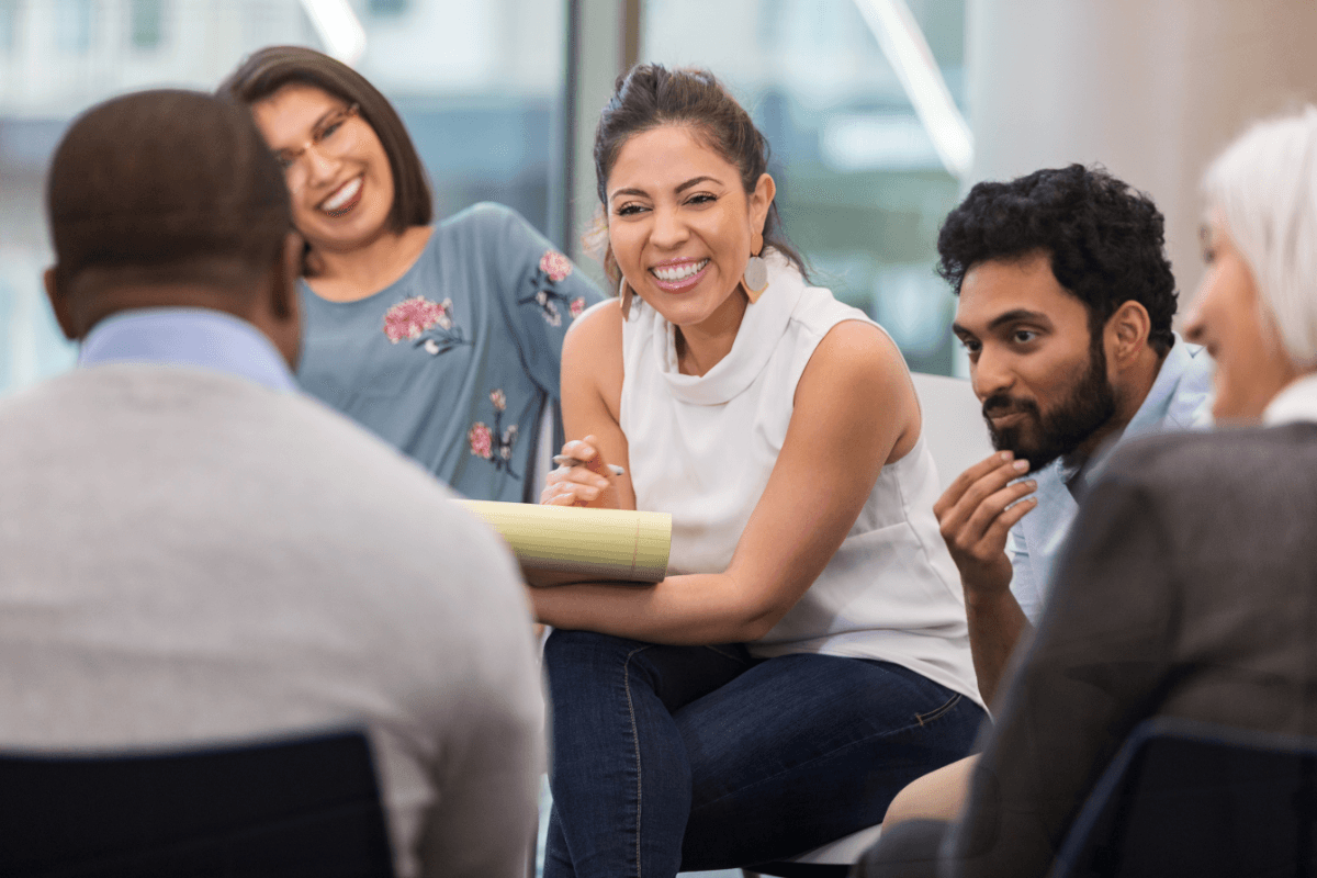 People talking together in a group therapy session