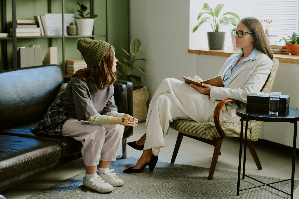 Woman joining a telehealth appointment from home